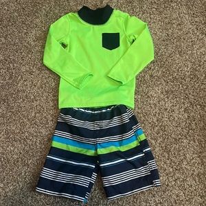 Children’s Place Boys rash guard and swim trunk set.